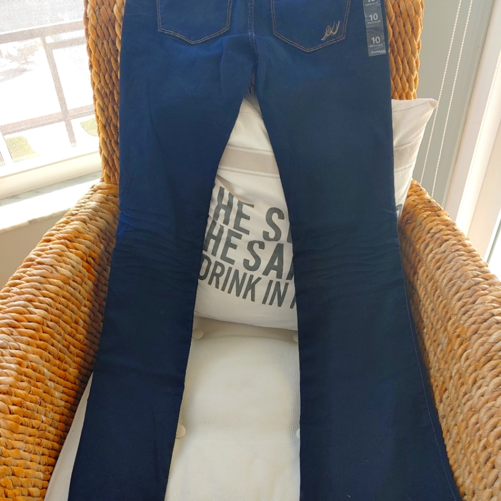 Never worn Express Blue Jeans, size 10R